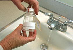 salesman testing the tap water in a home in Fremont, CA