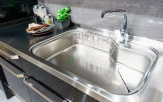 Angle View Of Kitchen Sink With Silver Faucet In Kitchen Room, M